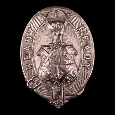 Lot 140 - A Merchiston Castle School OTC glengarry badge,...