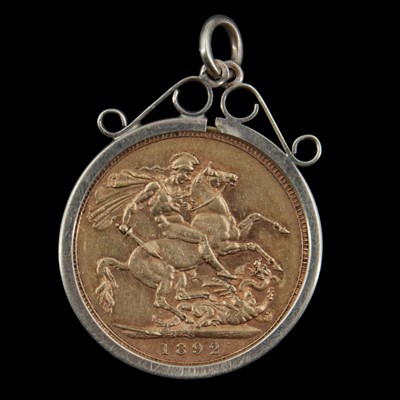 Lot 1340 - A Victorian 1892 gold sovereign coin in a 9 ct...