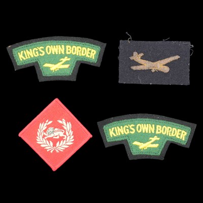 Lot 226 - King's Own Royal Border Regiment cloth...