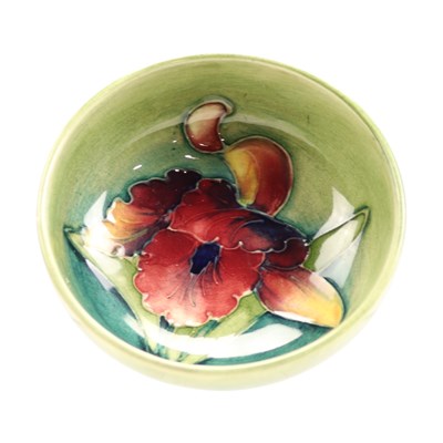 Lot 1072 - A Moorcroft "Orchid" pin or similar...