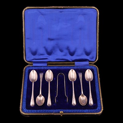 Lot 1165 - A cased set of George V silver teaspoons with...