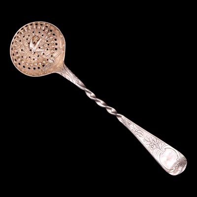 Lot 1161 - A William IV silver sifting spoon, the pierced...