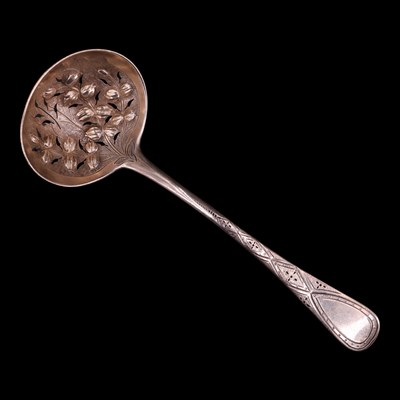 Lot 1162 - A George III silver sifting spoon, bearing...