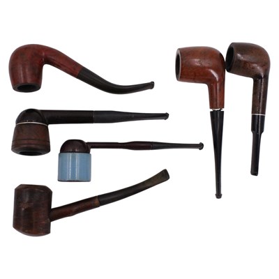 Lot 750 - A green-glazed ceramic pipe rack, together...