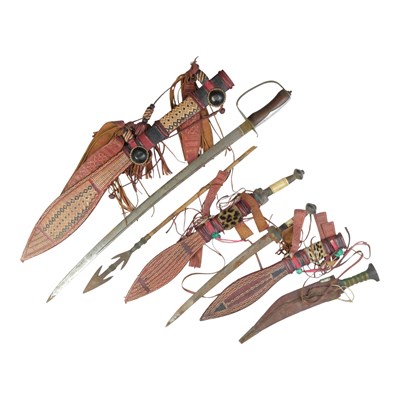 Lot 460 - A group of African weapons, including manding...