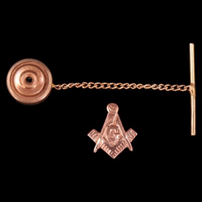 Lot 1370 - An early 1970s 9 ct rose-gold Masonic tie tack,...
