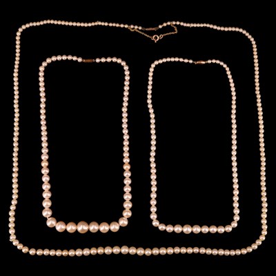 Lot 1372 - Three vintage single-strand necklaces of...