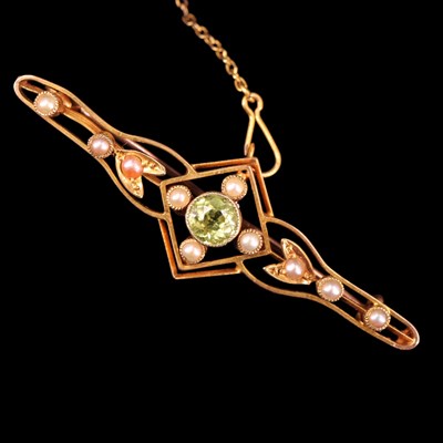 Lot 1374 - An early 20th Century peridot and seed-pearl...