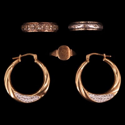 Lot 1388 - Two vintage yellow and white metal eternity...