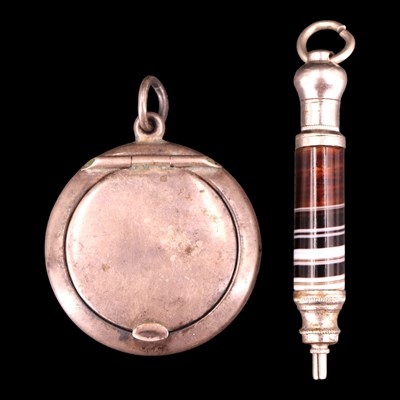 Lot 1192 - A mid-1940s silver powder compact, together...