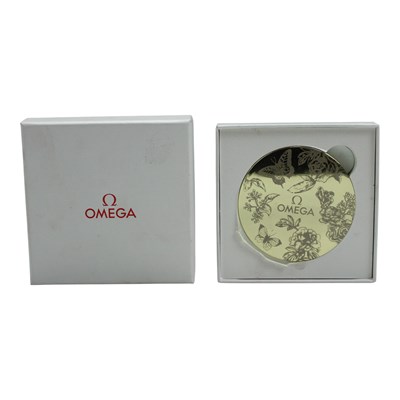 Lot 942 - A boxed Omega watches compact mirror