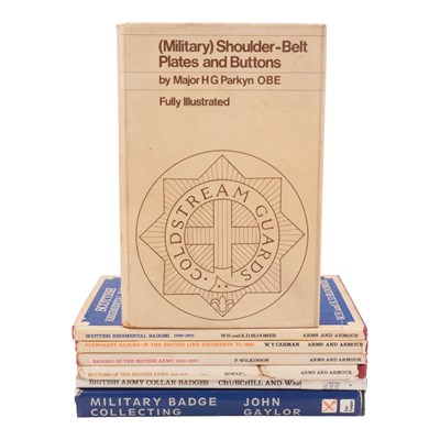 Lot 475 - A group of books on British military badges...