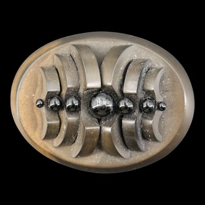Lot 1394 - A Victorian vulcanite brooch, being a series...