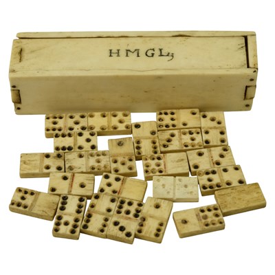 Lot 673 - A 19th Century dominoes box and tiles, having...