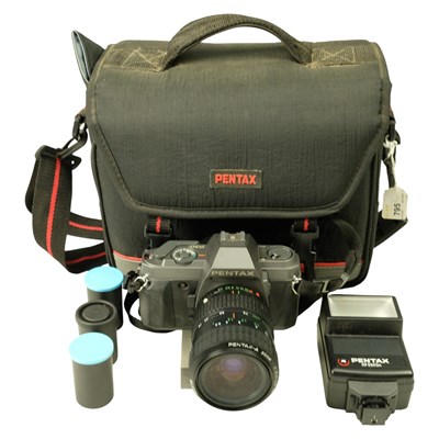Lot 795 - A cased vintage Pentax P30T film camera and AF...