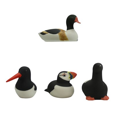 Lot 1071 - Three Isle of Arran Pottery bird figures,...