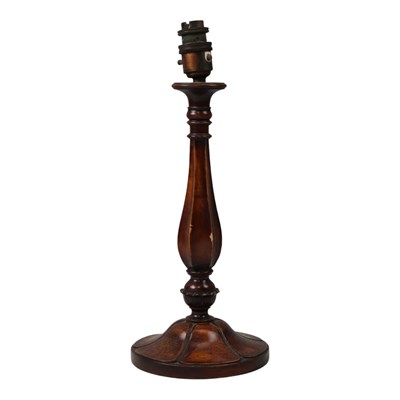 Lot 980 - An early 20th Century wooden table lamp, of...