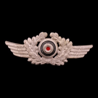 Lot 257 - A German Third Reich Luftwaffe aluminium cap...
