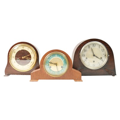 Lot 1510 - A 1930s / 1950s oak-cased domed mantel clock,...
