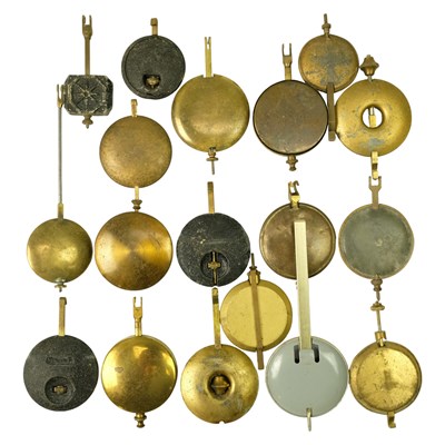 Lot 1517 - A quantity of vintage clock pendulums
