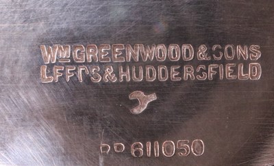 Lot 891 - A 1920s silver large swing-handled footed bowl,...