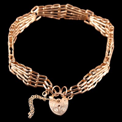 Lot 1420 - A 9 ct gold gate-link bracelet of long bars...