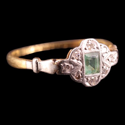 Lot 1428 - An early 20th Century emerald and diamond ring,...