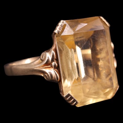 Lot 1398 - A citrine dress ring, comprising an...