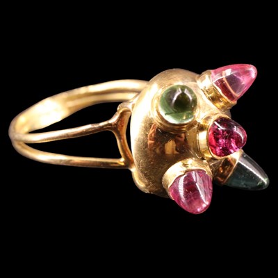 Lot 1400 - A striking gem-set dress ring, comprising a...