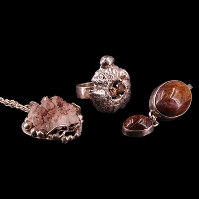 Lot 1409 - A Modernist silver and smoky quartz dress ring,...