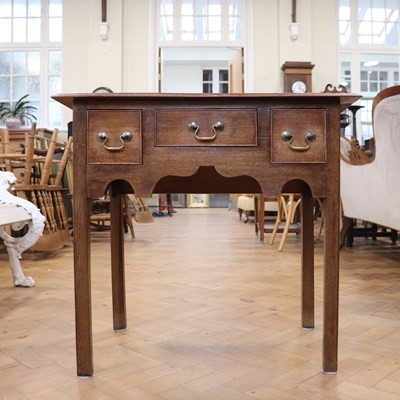 Lot 1647 - A George III oak lowboy, 50 cm x 77 cm x 71 cm
