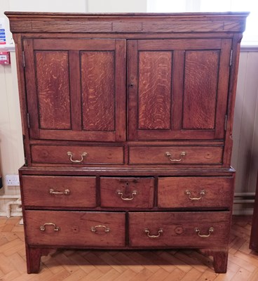 Lot 1670 - A George III and later diminutive oak cupboard...
