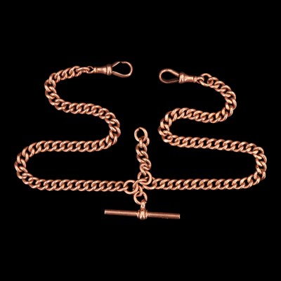Lot 1043 - An early 20th Century 9 ct gold curb-link...