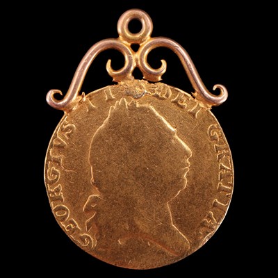 Lot 957 - A George III 1/2 spade guinea watch chain...