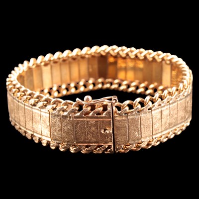Lot 958 - An early 1970s heavy 9 ct gold bracelet, of...