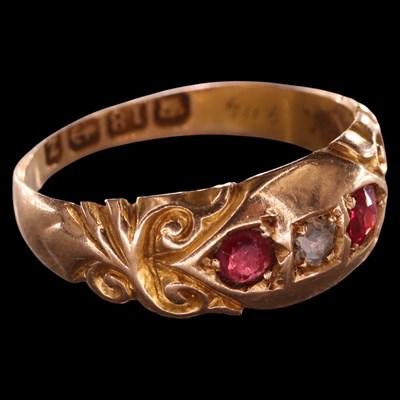 Lot 963 - A late Victorian three-stone diamond and ruby...