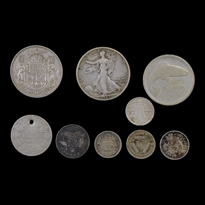 Lot 312 - A quantity of world silver coins, including a...