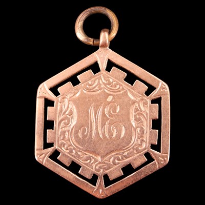 Lot 972 - A 1920s "Eaglesfield Art" 9 ct gold prize fob...