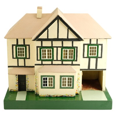 Lot 667 - A mid 20th Century painted wooden doll's house,...