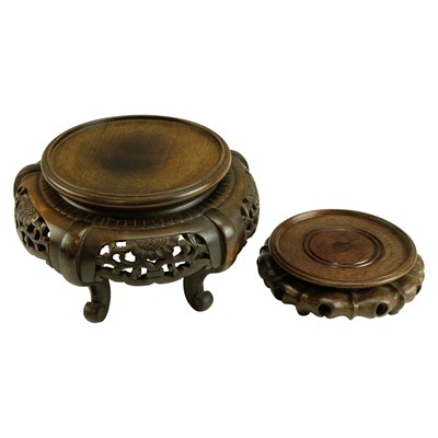 Lot 740 - A Chinese pierced-and-carved hardwood stand,...