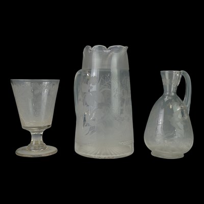 Lot 867 - A Victorian glass ewer, having a crimped and...