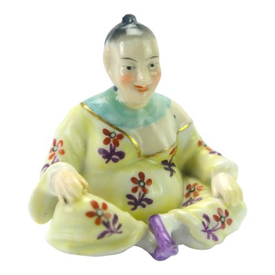 Lot 809 - A small 19th Century porcelain figurine of a...