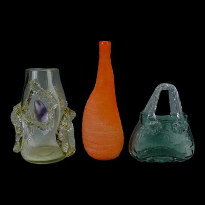 Lot 864 - A studio glass "handbag" vase, together with...