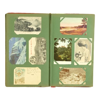 Lot 285 - An Edwardian postcard album, containing a...