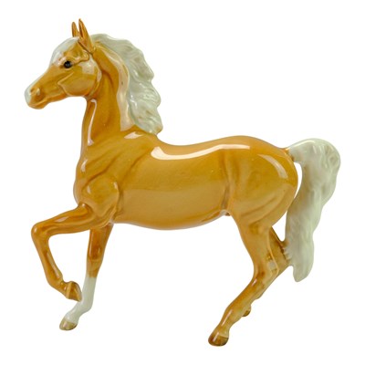 Lot 837 - A Beswick figure of a prancing Arab palomino...