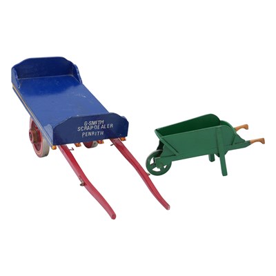 Lot 638 - A painted wooden model of a cart, inscribed,...