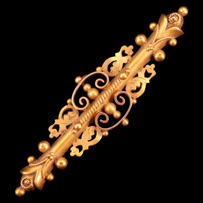 Lot 976 - A late Victorian 15 ct gold bar brooch, being...