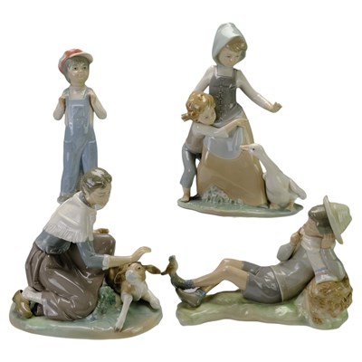 Lot 813 - Four Lladro figurines, comprising "Boy From...