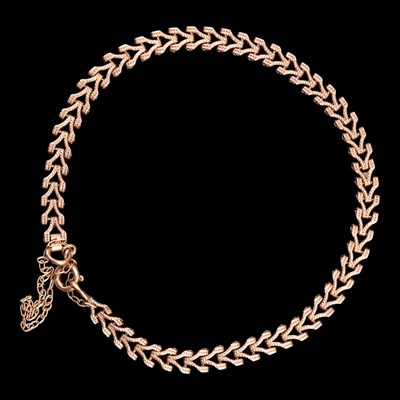Lot 1029 - A 1980 9 ct gold wishbone-link bracelet, 18 cm,...