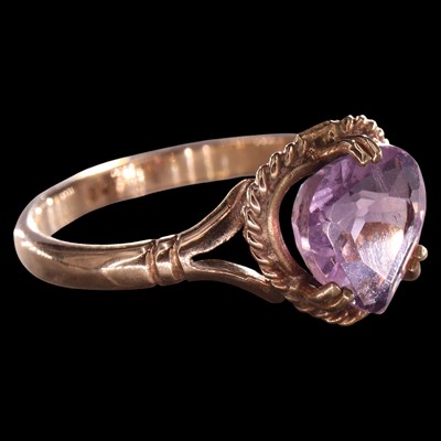 Lot 1015 - A vintage amethyst heart ring, comprising a...